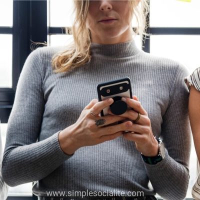 3 Girls Using Social Media On Their Phones