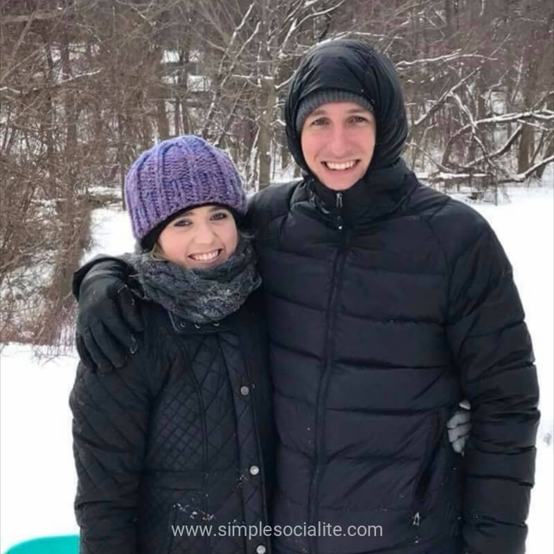 Jenn, the Simple Socialite, and her partner, John in the snow
